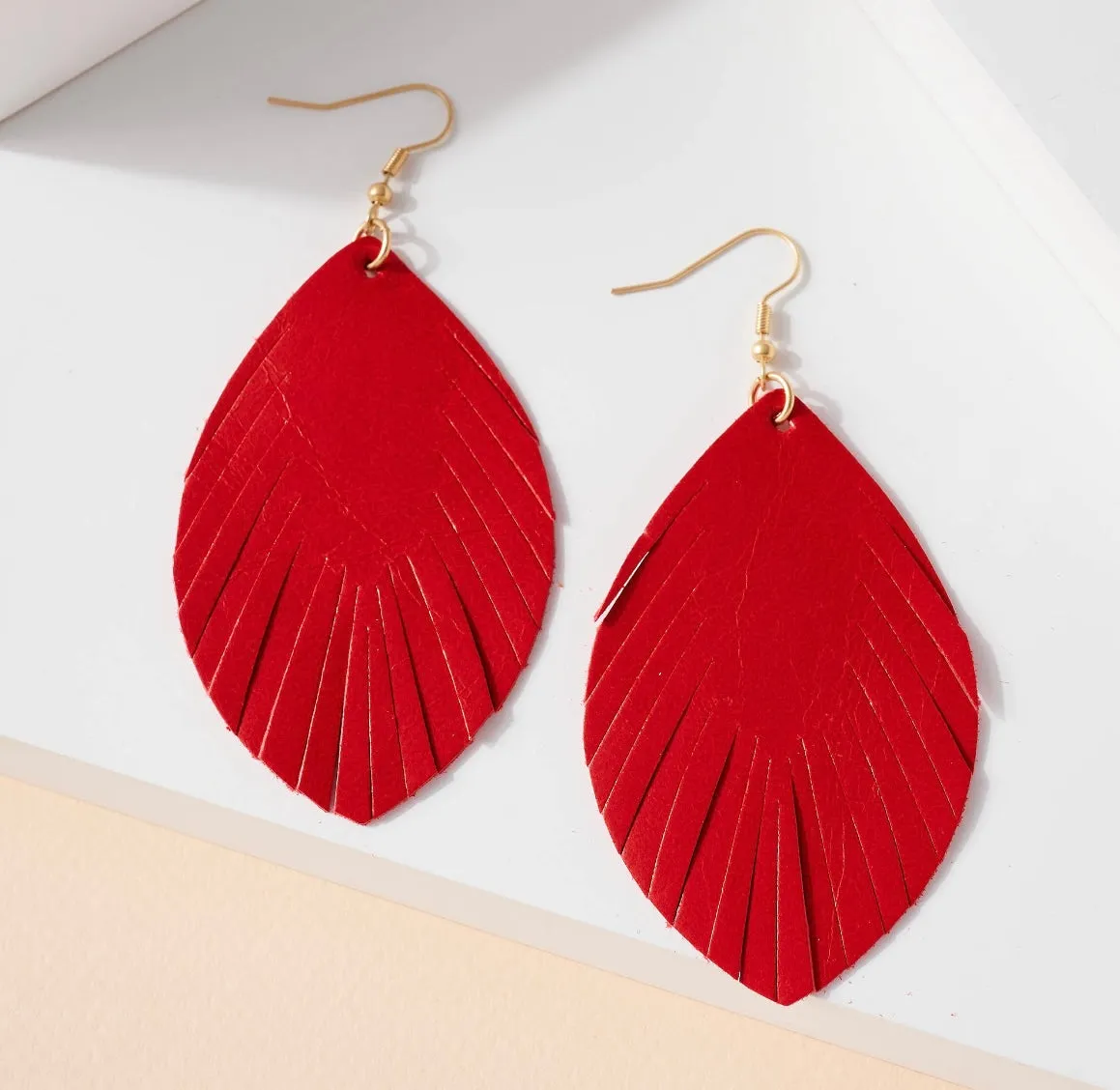 “Lizza” Leatherette Feather Earrings